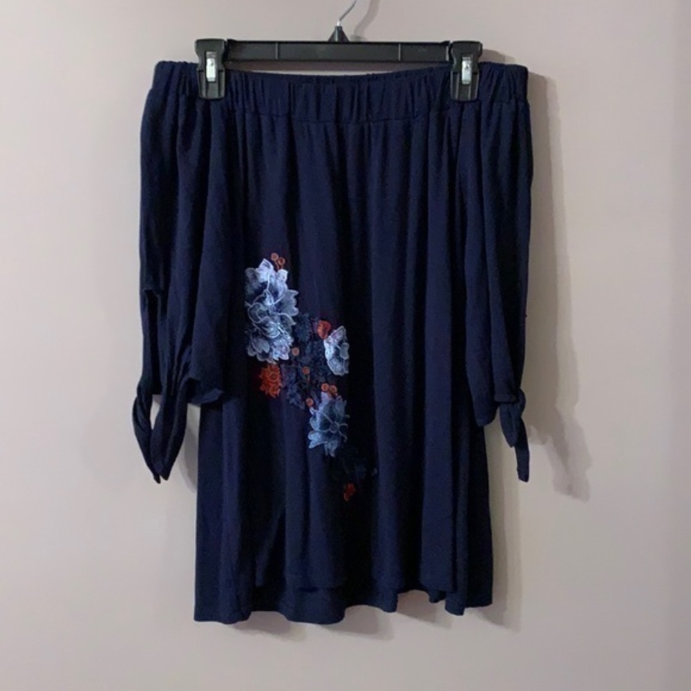Off the shoulder navy blue blouse with flowers Small pebble and stone